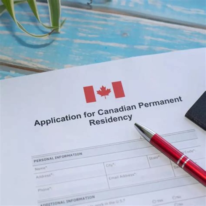 How long do you have to be married to get permanent residency in Canada?